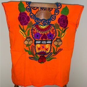 Hand-embroidered artisan blouse made in Mexico small size.
